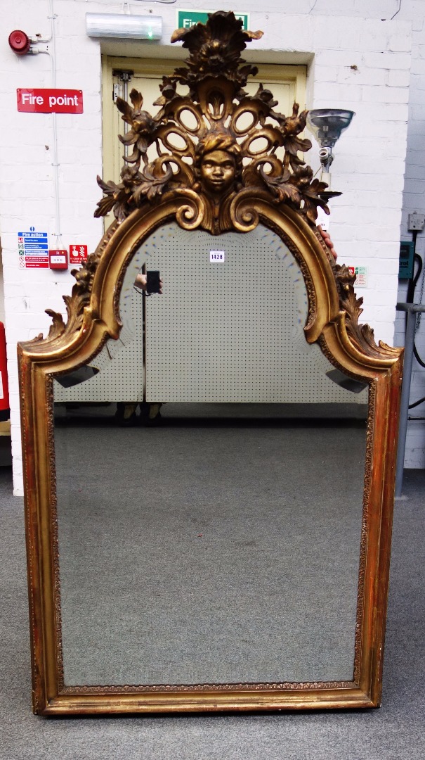 Appraisal: A Victorian gilt framed arch top wall mirror the pierced