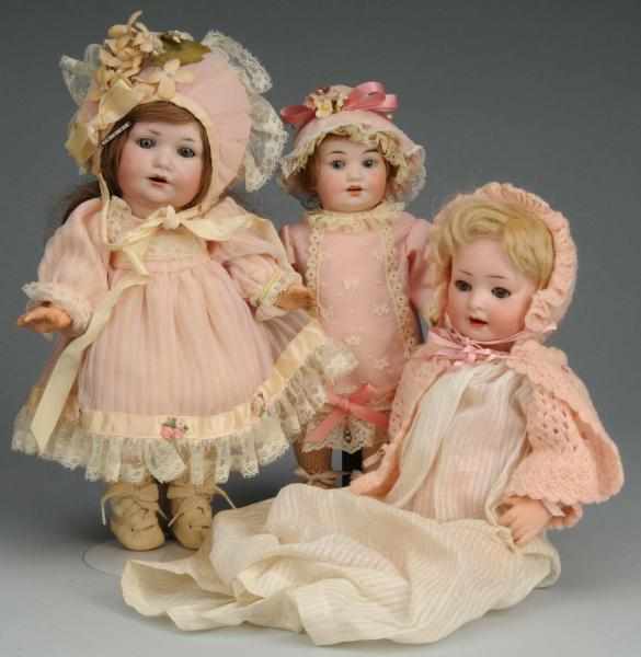 Appraisal: Lot of German Bisque Character Dolls Description Revalo sleeping eyes