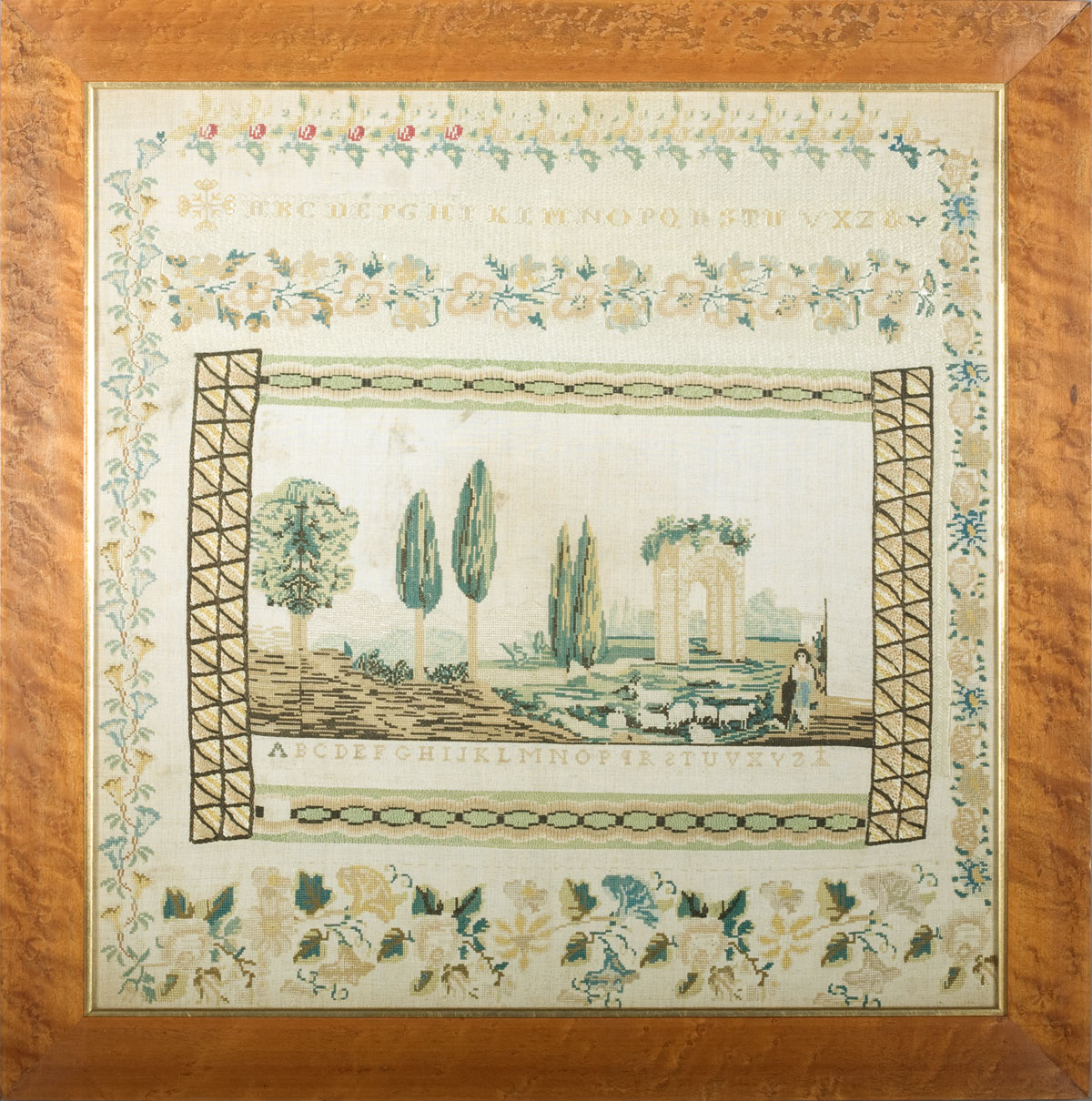 Appraisal: ELABORATE EUROPEAN SAMPLER With central landscape scene two alphabets and