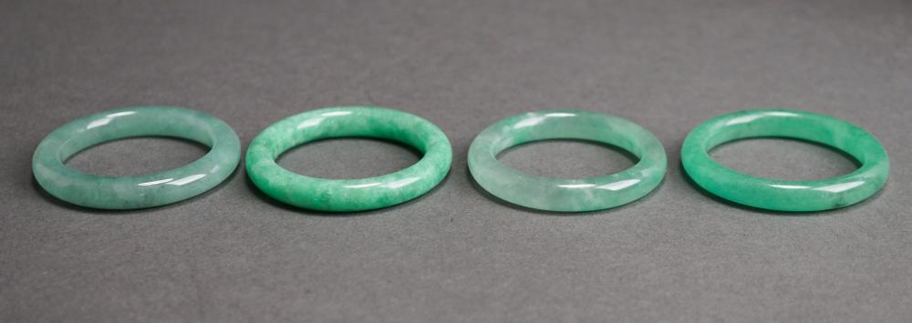 Appraisal: Two Pairs of Apple Green Jade Youth Bangle Bracelets L