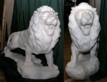 Appraisal: A Pair of Standing Marble Lions th Century Massive these