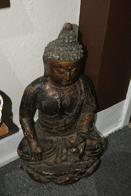 Appraisal: Chinese carved wood and painted seated buddha th th Century