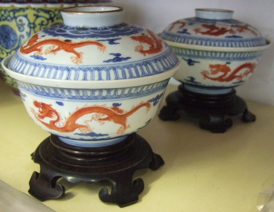 Appraisal: A pair of underglaze blue and iron-red bowls and covers