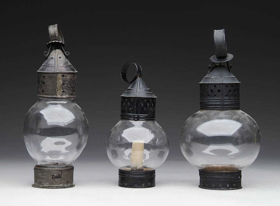 Appraisal: THREE ONION TYPE LANTERNS lantern with removable candleholder base having