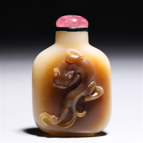 Appraisal: Finely carved Chinese jade snuff bottle with qilong in high