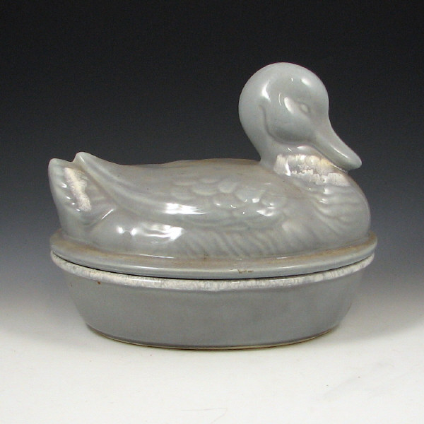 Appraisal: Hull Gray Duck Covered Casserole House Garden duck covered casserole