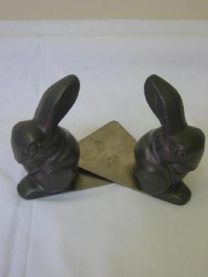 Appraisal: A PAIR OF DUTCH ART DECO PEWTER BOOK ENDS modelled