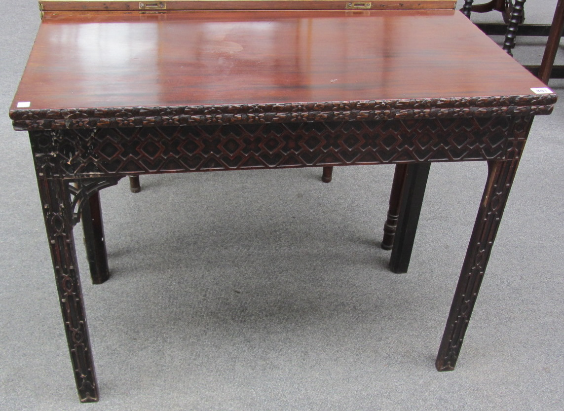 Appraisal: A George III mahogany rectangular card table on chamfered square