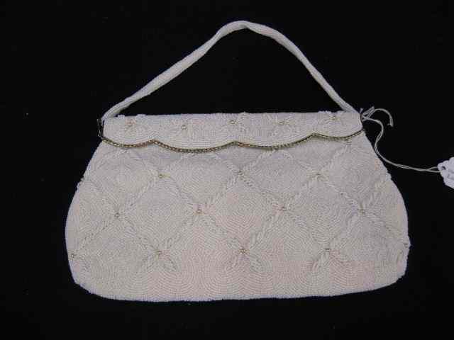 Appraisal: White Beaded Purse triangular designs