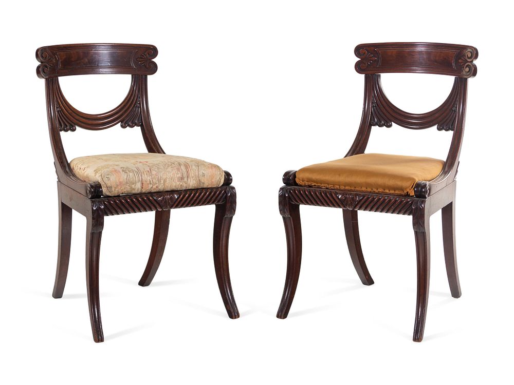 Appraisal: A Pair of Late Regency Carved and Figured Mahogany Side