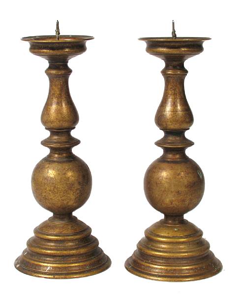 Appraisal: A pair of Italian style bronze prickets height in diameter