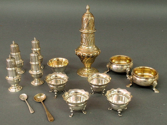 Appraisal: Group of hallmarked English silver- master salts pepper shakers caster