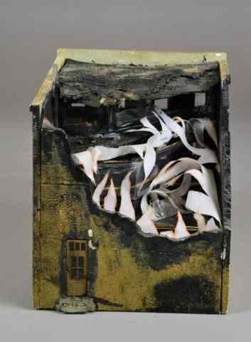 Appraisal: A BURNING BUILDING MODELTo include bombed out building fan and