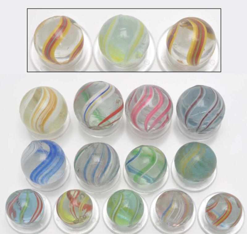 Appraisal: Lot of Handmade Marbles Description Includes various multicolored banded transparent