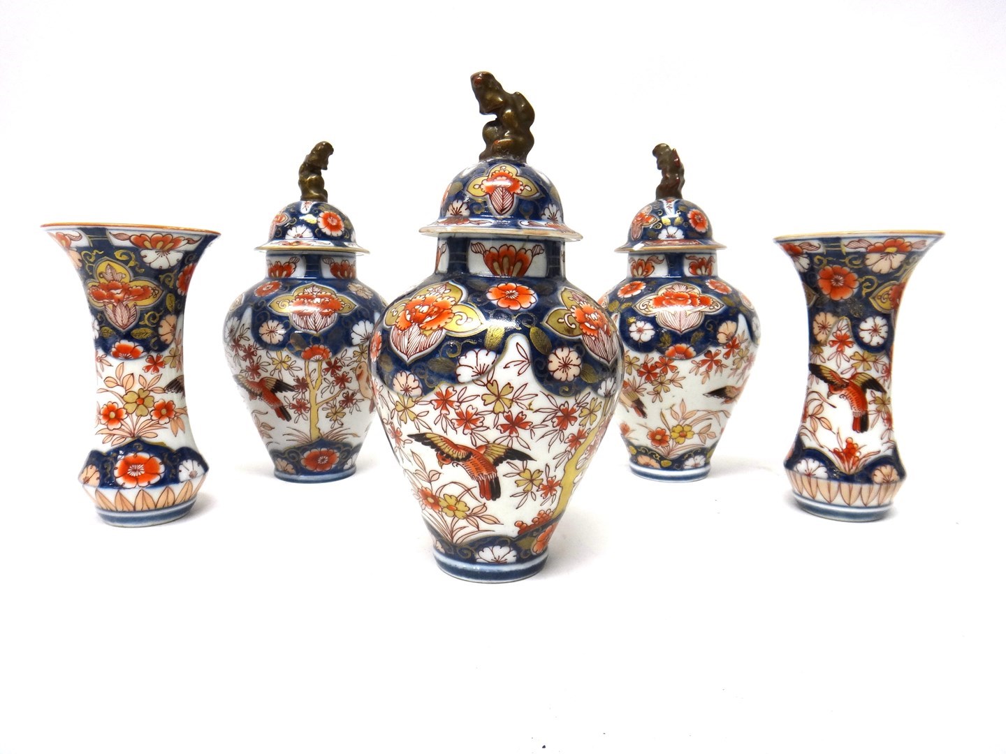 Appraisal: A Continental porcelain Imari pattern garniture of vases probably Samson