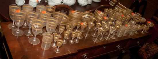 Appraisal: Group of gilt and etched glass stemware tumblers dessert bowls