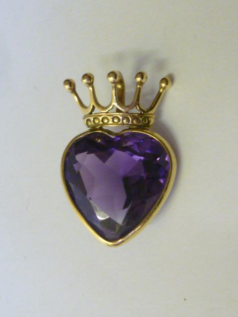 Appraisal: AN AMETHYST PENDANT the heart cut amethyst in ct gold