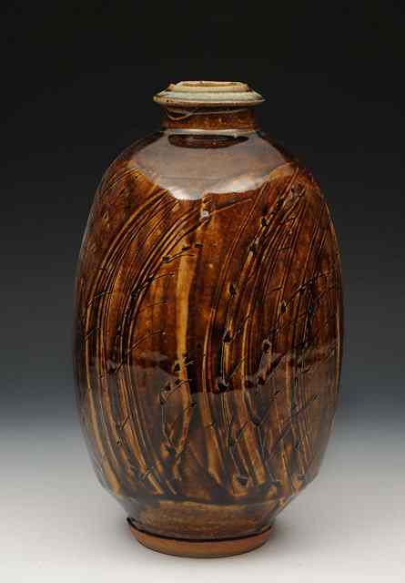 Appraisal: Phil Rogers British b A stoneware squared bottle shape vase