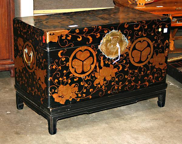 Appraisal: A Chinese camphor wood storage chest on stand Of rectangular