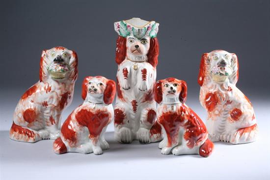 Appraisal: FIVE STAFFORDSHIRE SPANIELS mid- th century Comprising a seated pair