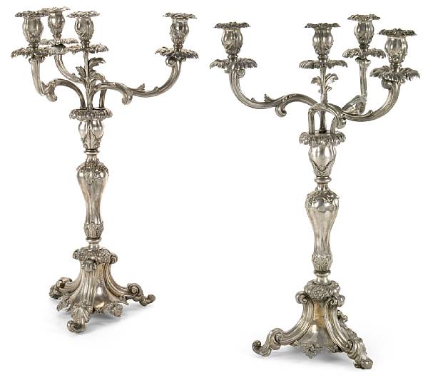 Appraisal: A pair of Continental silverplated four light candelabra late th