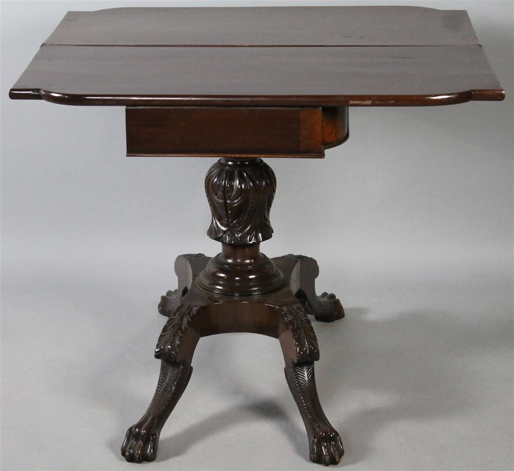 Appraisal: CLASSICAL STYLE CARVED MAHOGANY GAMES TABLE having a hinged and