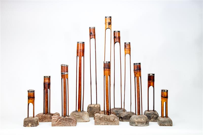 Appraisal: Group of Twelve Candlesticks Bamboo wood silver-plated collars in to