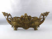 Appraisal: A continental brass centrepiece in the Art Noveau manner circa