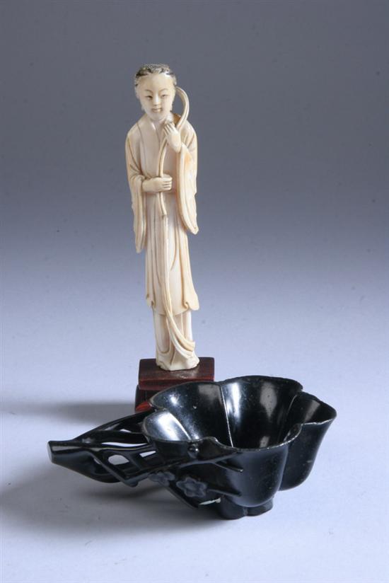 Appraisal: CHINESE DARK GREEN SOAPSTONE COUPE AND IVORY FIGURE th th