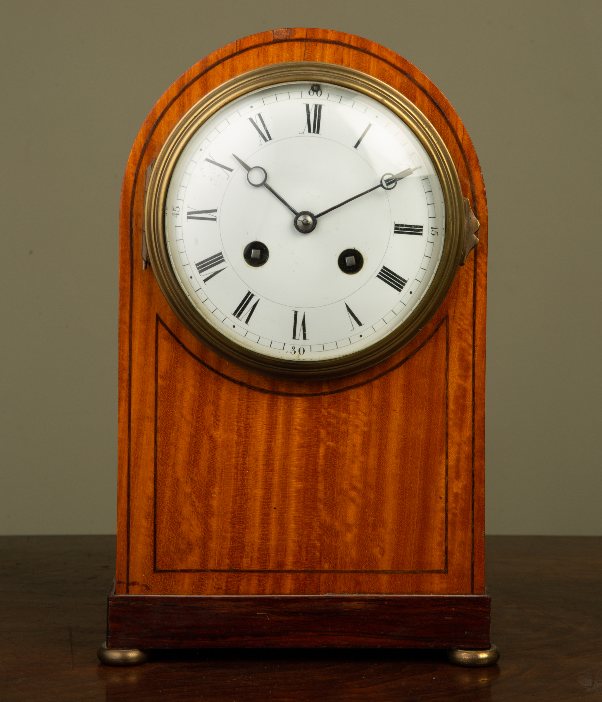 Appraisal: A late th early th century satinwood mantle clock the