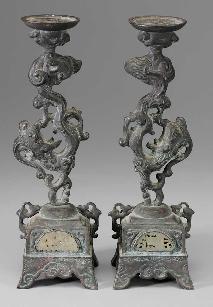 Appraisal: Pair Copper Candlesticks Chinese drip plates held aloft by dragons