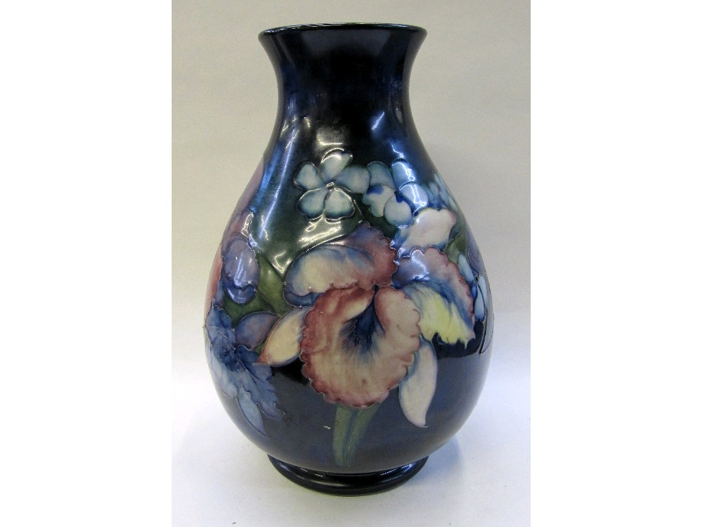 Appraisal: Moorcroft frilled orchid baluster vase on blue ground paper label