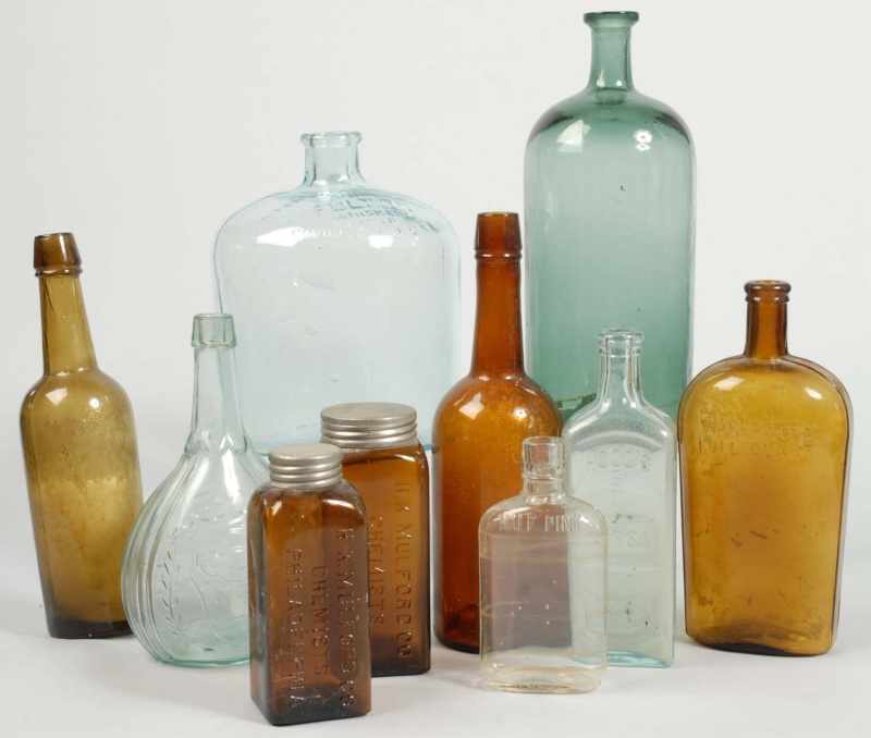 Appraisal: Lot of Glass Bottles Description Includes one large green glass