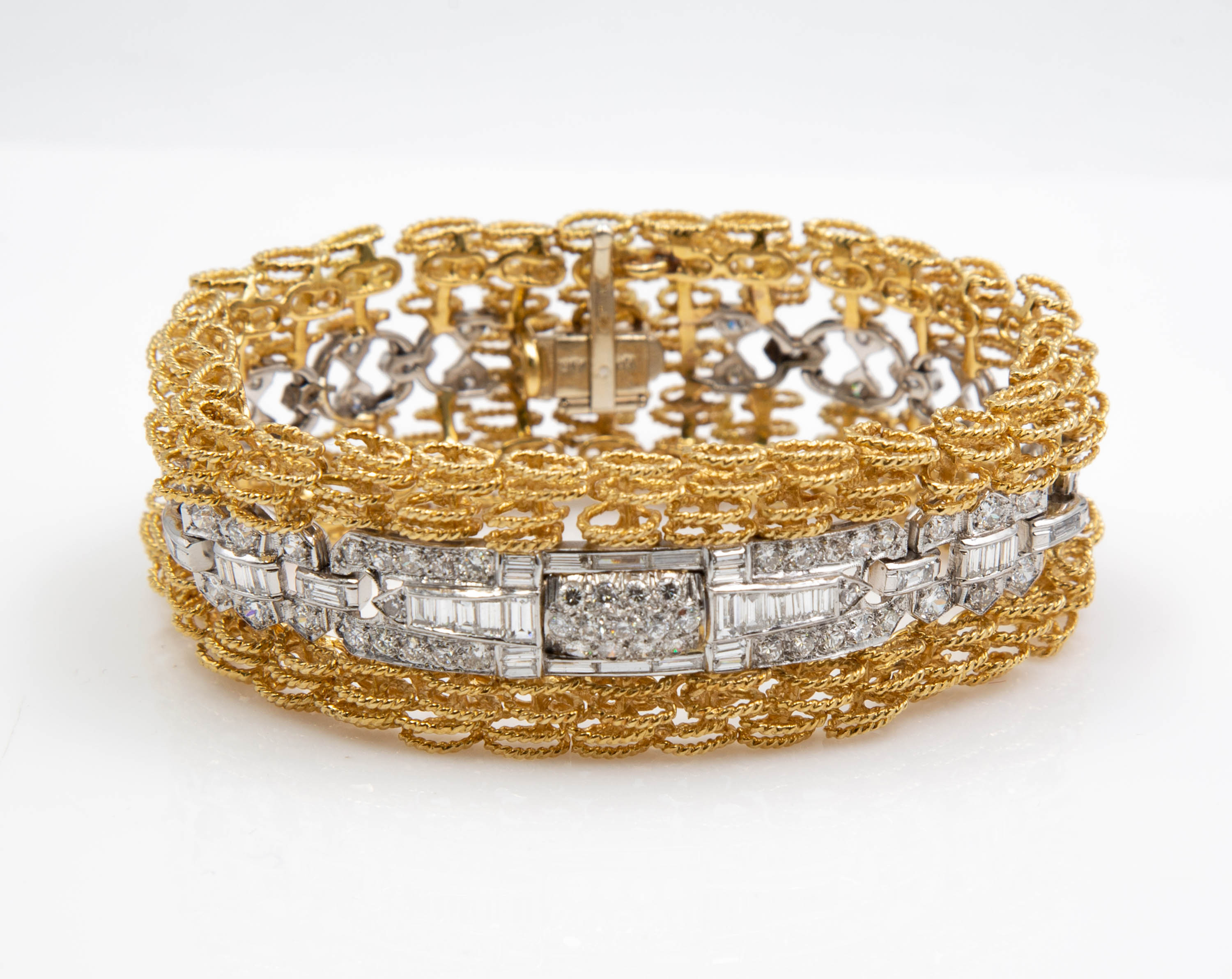 Appraisal: K GOLD PLATINUM AND DIAMOND BRACELET kt yellow gold bracelet