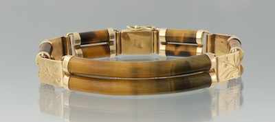 Appraisal: A Ladies' Carved Tiger Eye and Gold Bracelet k yellow