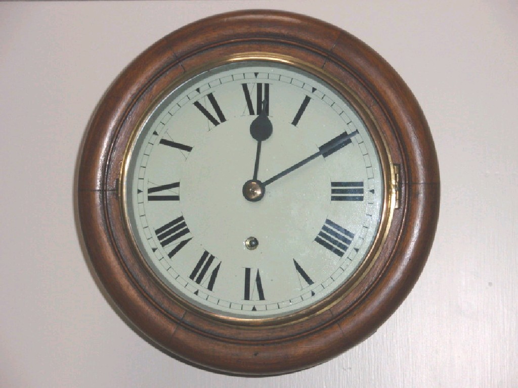 Appraisal: A mahogany bezel wall clock with painted dial cm dia