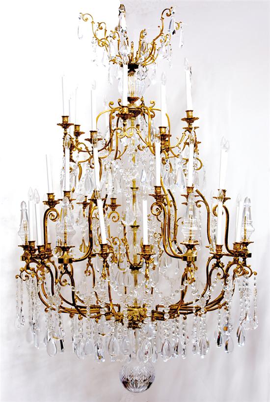 Appraisal: Large gilt-metal and crystal thirty-six light chandelier baluster-form stem supporting