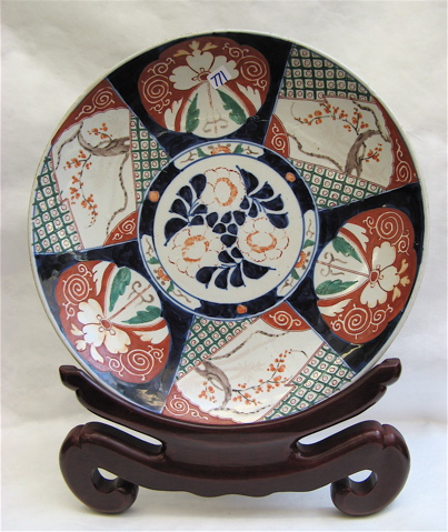 Appraisal: JAPANESE IMARI PORCELAIN CHARGER Traditionally hand painted with center floral