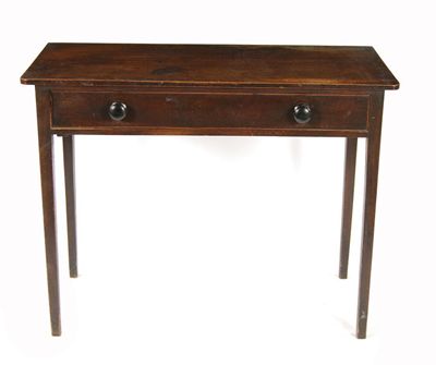 Appraisal: A late George III mahogany side table with rounded front