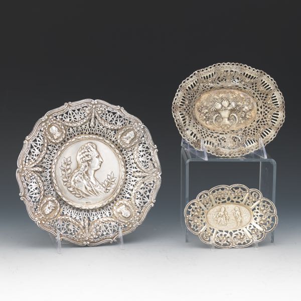 Appraisal: THREE GERMAN SILVER BAROQUE STYLE RETICULATED GRADUATED SIZE DISHES German