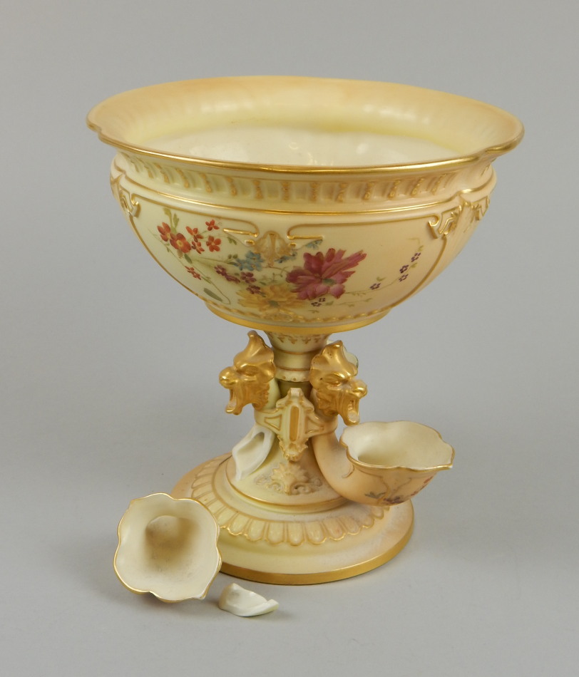 Appraisal: A Victorian Royal Worcester blush ivory centerpiece the central bowl