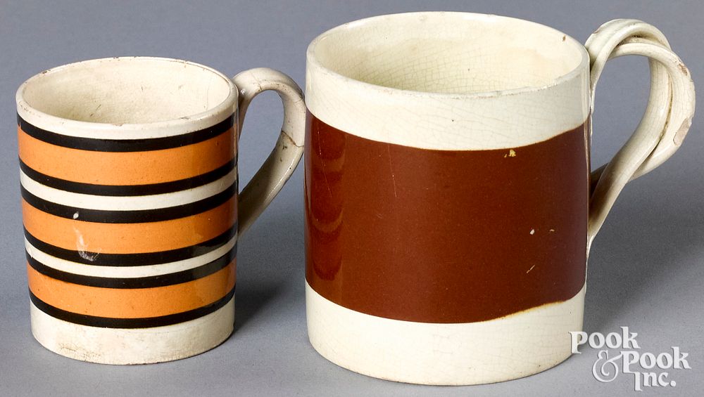 Appraisal: Two mocha mugs with brown and tan bands Two mocha