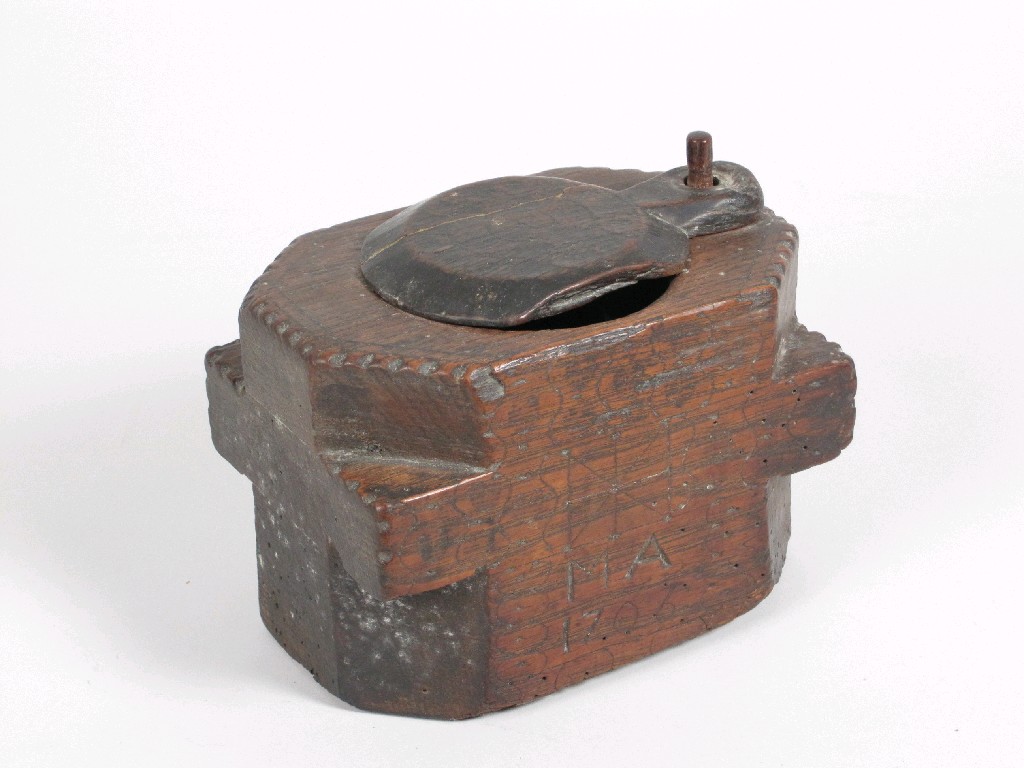 Appraisal: An th Century scratch carved oak Mortar with swivel lid