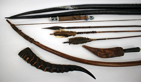 Appraisal: AN OLD HARDWOOD POSSIBLY NATIVE AMERICAN INDIAN BOW and three