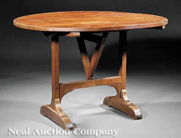 Appraisal: An Antique French Pine Wine Table th c the circular