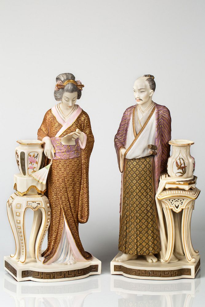 Appraisal: AN ENGLISH PORCELAIN AND ENAMEL PAIR OF FIGURES OF A