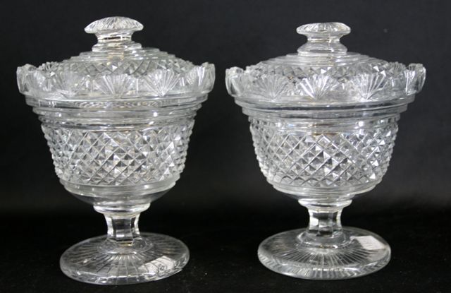 Appraisal: A pair of Georgian diamond cut glass bonbonniers and covers