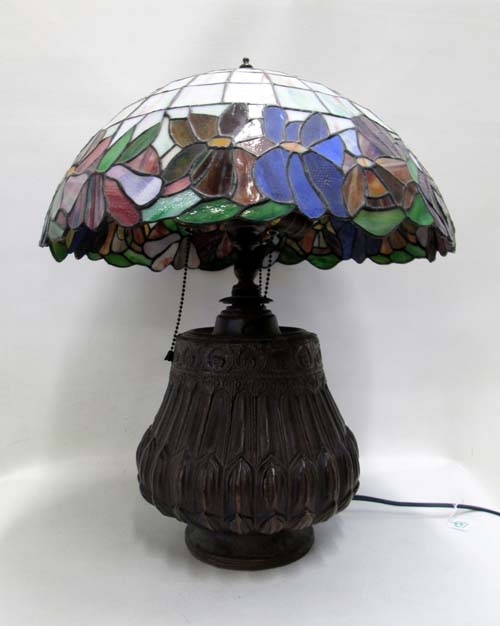 Appraisal: LEAD GLASS TABLE LAMP having domed shade with a colorful