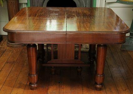 Appraisal: ENGLISH VICTORIAN MAHOGANY EXTENSION DINING TABLE The rectangular molded top