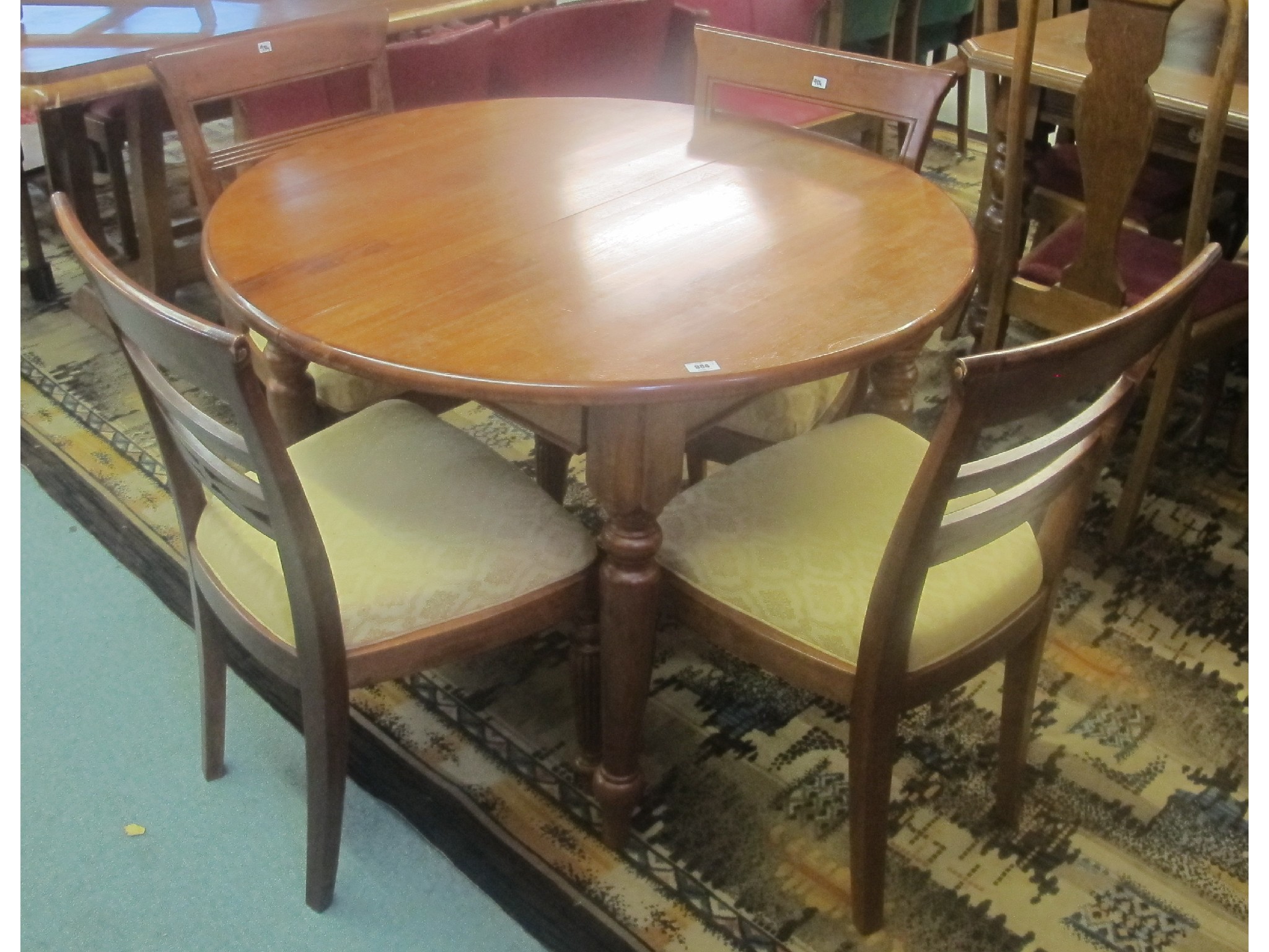 Appraisal: Four reproduction mahogany chairs and a table